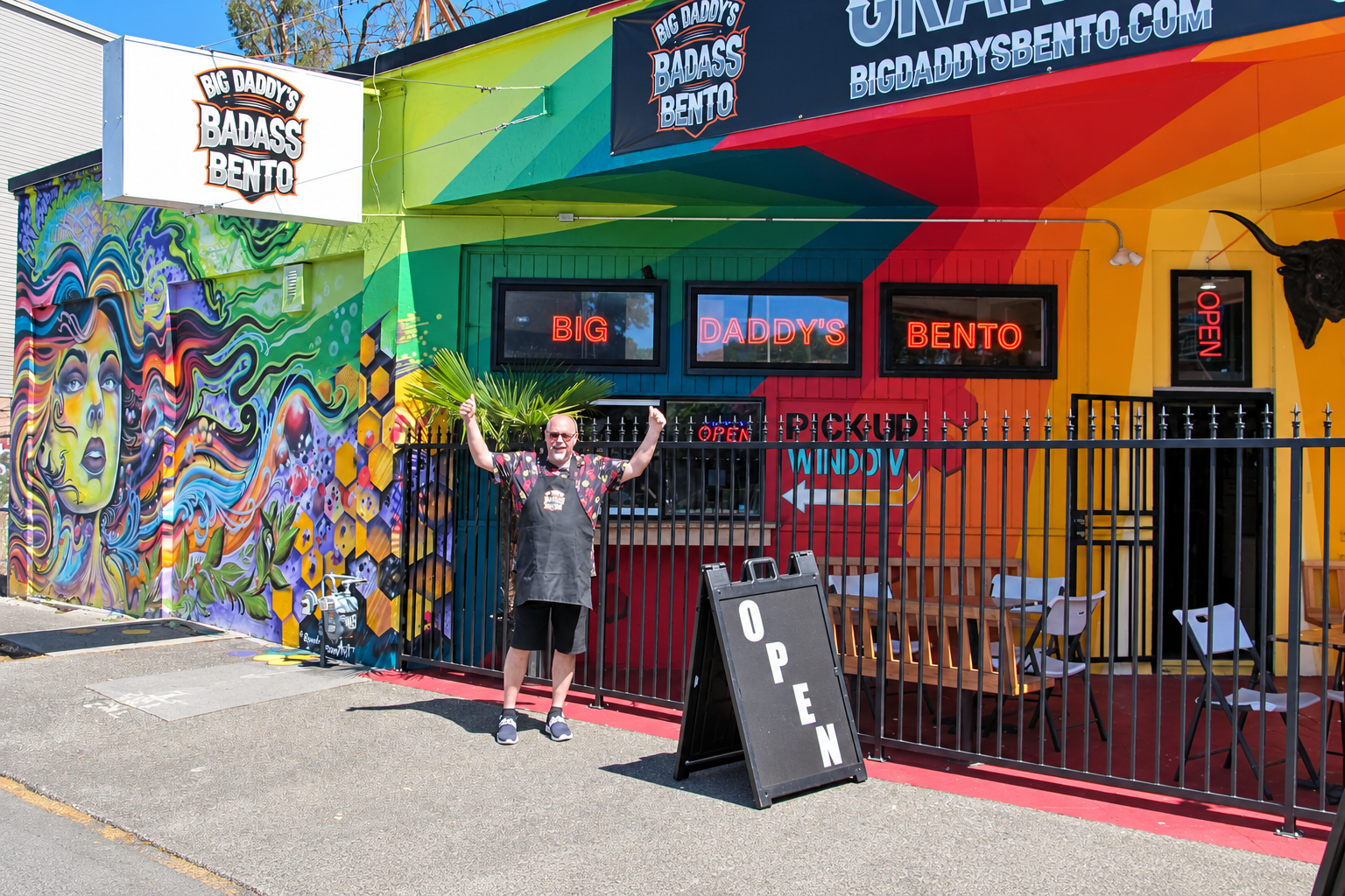 Inside Big Daddy's Badass Bento — warm lighting and sports memorabilia